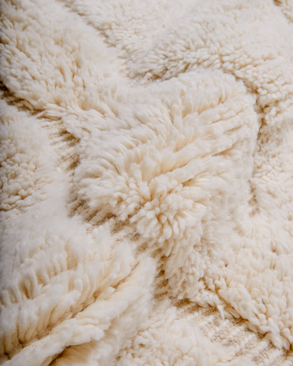 Detail of wool texture of Berberlin beniourain rug.